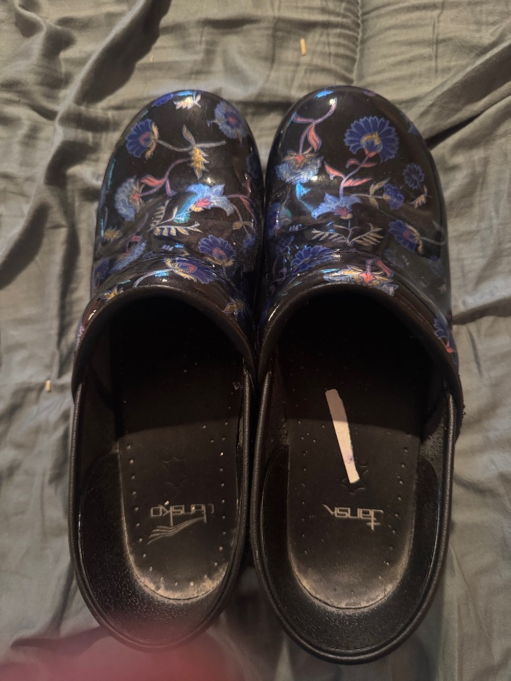 Dansko Black Floral Patent Clogs